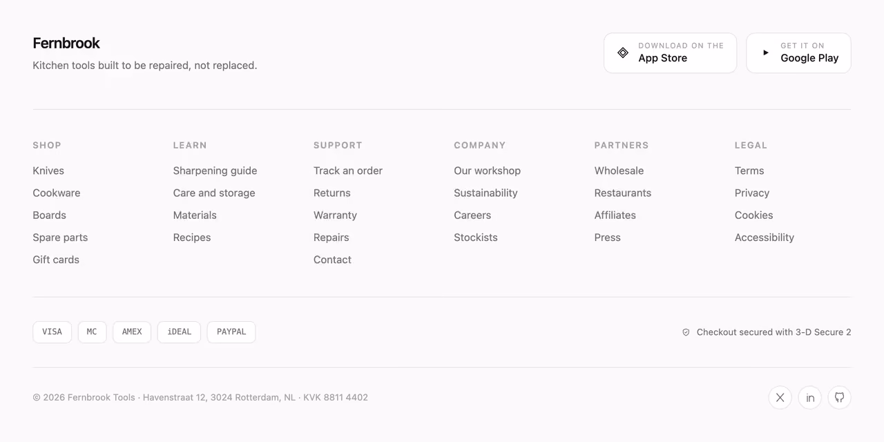 Rendered preview — Mega footer with app badges